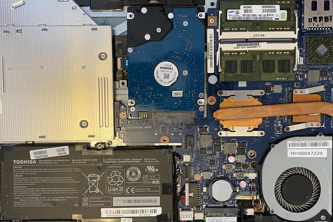 The underside of the laptop with the cover removed